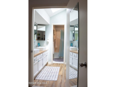 Welcome to this gorgeous, modernized end-unit = 109 Egret Ct on Olde Point Golf and Country Club in North Carolina - for sale on GolfHomes.com, golf home, golf lot