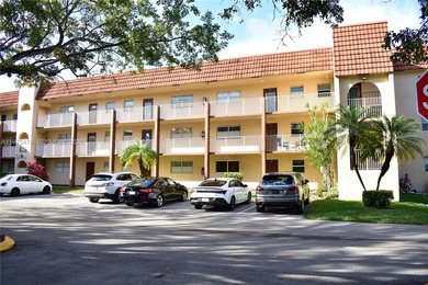 This first floor corner unit is facing the largest lake in on Sunrise Lakes Phase III in Florida - for sale on GolfHomes.com, golf home, golf lot