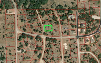 This level and mostly cleared lot offers a serene setting on Slick Rock Golf Course - Horseshoe Bay in Texas - for sale on GolfHomes.com, golf home, golf lot