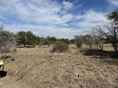 This level and mostly cleared lot offers a serene setting on Slick Rock Golf Course - Horseshoe Bay in Texas - for sale on GolfHomes.com, golf home, golf lot