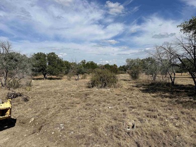 This level and mostly cleared lot offers a serene setting on Slick Rock Golf Course - Horseshoe Bay in Texas - for sale on GolfHomes.com, golf home, golf lot