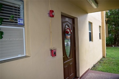 This first floor corner unit is facing the largest lake in on Sunrise Lakes Phase III in Florida - for sale on GolfHomes.com, golf home, golf lot