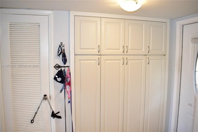 This first floor corner unit is facing the largest lake in on Sunrise Lakes Phase III in Florida - for sale on GolfHomes.com, golf home, golf lot