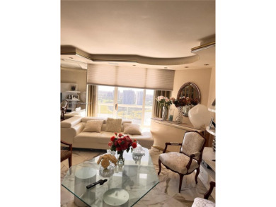 Enjoy stunning views from the 26th floor of this spacious on Turnberry Isle Resort and Club in Florida - for sale on GolfHomes.com, golf home, golf lot