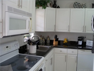 This condo shows like a MODEL and being sold furnished with a on Monterey Yacht and Country Club in Florida - for sale on GolfHomes.com, golf home, golf lot