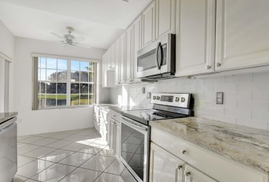 Welcome to this pristine coach home in the sought-after on The Boca Country Club in Florida - for sale on GolfHomes.com, golf home, golf lot