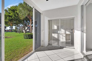 Welcome to this pristine coach home in the sought-after on The Boca Country Club in Florida - for sale on GolfHomes.com, golf home, golf lot