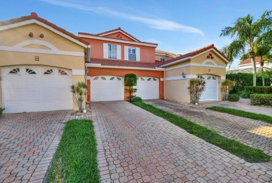 Welcome to this pristine coach home in the sought-after on The Boca Country Club in Florida - for sale on GolfHomes.com, golf home, golf lot