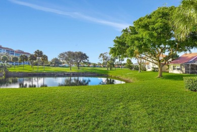 Welcome to this pristine coach home in the sought-after on The Boca Country Club in Florida - for sale on GolfHomes.com, golf home, golf lot