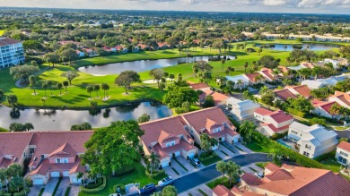 Welcome to this pristine coach home in the sought-after on The Boca Country Club in Florida - for sale on GolfHomes.com, golf home, golf lot