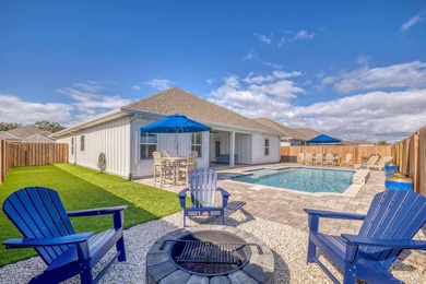 Waiting for a POOL HOME in the Tiger Point Area of Gulf Breeze? on Tiger Point Golf and Country Club in Florida - for sale on GolfHomes.com, golf home, golf lot