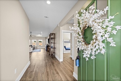 Waiting for a POOL HOME in the Tiger Point Area of Gulf Breeze? on Tiger Point Golf and Country Club in Florida - for sale on GolfHomes.com, golf home, golf lot