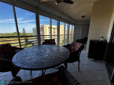 Welcome to this stunning 7th-floor condo in Environ Tower II on Inverrary Country Club in Florida - for sale on GolfHomes.com, golf home, golf lot