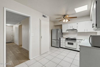 Updated and move-in ready! This 2 bed, 2 bath patio home in Sun on Sun City Lakes West and East in Arizona - for sale on GolfHomes.com, golf home, golf lot