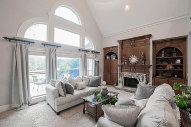 Experience refined living at 1041 Windermere Crossing an elegant on Windermere Golf Club in Georgia - for sale on GolfHomes.com, golf home, golf lot