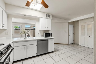 Updated and move-in ready! This 2 bed, 2 bath patio home in Sun on Sun City Lakes West and East in Arizona - for sale on GolfHomes.com, golf home, golf lot
