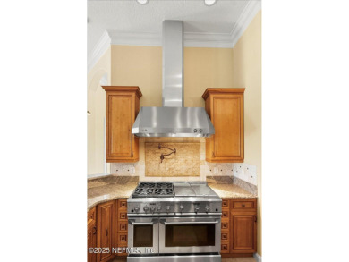 Stunning one of a kind 4BR/5.5BA custom home in Eagle Harbor on Eagle Harbor Golf Club in Florida - for sale on GolfHomes.com, golf home, golf lot