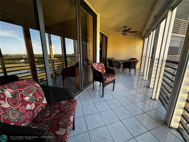 Welcome to this stunning 7th-floor condo in Environ Tower II on Inverrary Country Club in Florida - for sale on GolfHomes.com, golf home, golf lot