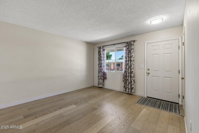 Updated and move-in ready! This 2 bed, 2 bath patio home in Sun on Sun City Lakes West and East in Arizona - for sale on GolfHomes.com, golf home, golf lot