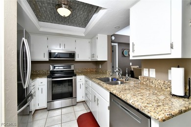 First-floor condo featuring 2 primary suites and a den! All ages on Cross Creek Country Club in Florida - for sale on GolfHomes.com, golf home, golf lot