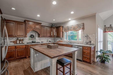 Experience refined living at 1041 Windermere Crossing an elegant on Windermere Golf Club in Georgia - for sale on GolfHomes.com, golf home, golf lot