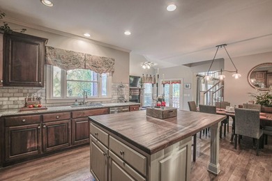 Experience refined living at 1041 Windermere Crossing an elegant on Windermere Golf Club in Georgia - for sale on GolfHomes.com, golf home, golf lot