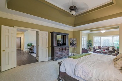 Experience refined living at 1041 Windermere Crossing an elegant on Windermere Golf Club in Georgia - for sale on GolfHomes.com, golf home, golf lot