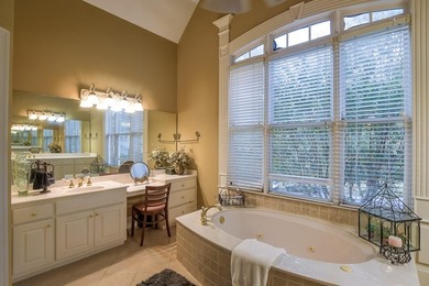 Experience refined living at 1041 Windermere Crossing an elegant on Windermere Golf Club in Georgia - for sale on GolfHomes.com, golf home, golf lot