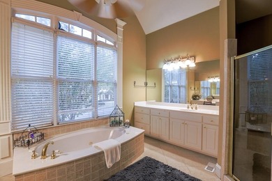 Experience refined living at 1041 Windermere Crossing an elegant on Windermere Golf Club in Georgia - for sale on GolfHomes.com, golf home, golf lot