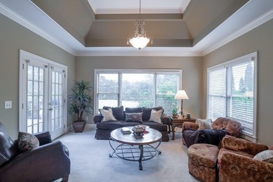 Experience refined living at 1041 Windermere Crossing an elegant on Windermere Golf Club in Georgia - for sale on GolfHomes.com, golf home, golf lot