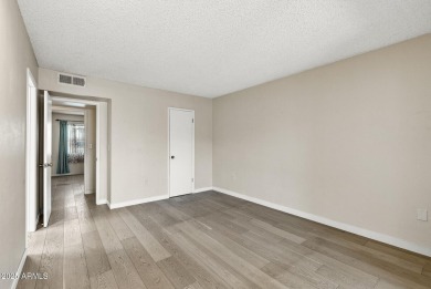 Updated and move-in ready! This 2 bed, 2 bath patio home in Sun on Sun City Lakes West and East in Arizona - for sale on GolfHomes.com, golf home, golf lot