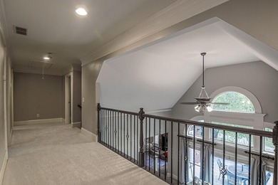 Experience refined living at 1041 Windermere Crossing an elegant on Windermere Golf Club in Georgia - for sale on GolfHomes.com, golf home, golf lot