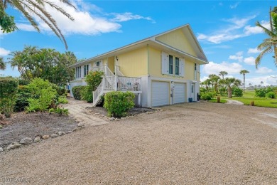 Welcome to, a cozy elevated 'island cottage' perfectly situated on The Dunes Golf and Tennis Club in Florida - for sale on GolfHomes.com, golf home, golf lot