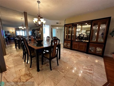 Welcome to this stunning 7th-floor condo in Environ Tower II on Inverrary Country Club in Florida - for sale on GolfHomes.com, golf home, golf lot