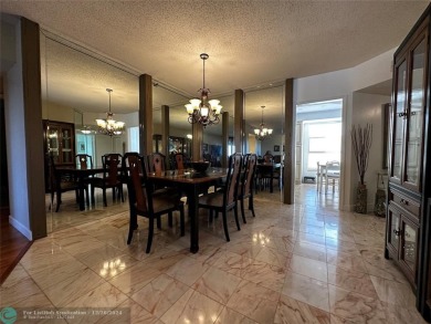 Welcome to this stunning 7th-floor condo in Environ Tower II on Inverrary Country Club in Florida - for sale on GolfHomes.com, golf home, golf lot