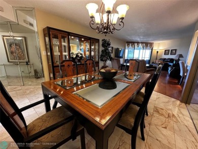 Welcome to this stunning 7th-floor condo in Environ Tower II on Inverrary Country Club in Florida - for sale on GolfHomes.com, golf home, golf lot