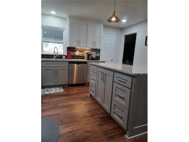 Builders own home! Beautifully remodeled *made new again*! 4 bed on Paola Country Club in Kansas - for sale on GolfHomes.com, golf home, golf lot