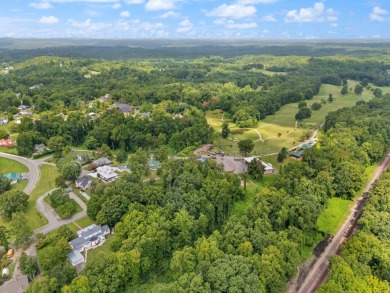 Welcome to 27 Butler Drive! This charming home is conveniently on Stearns Golf Club in Kentucky - for sale on GolfHomes.com, golf home, golf lot