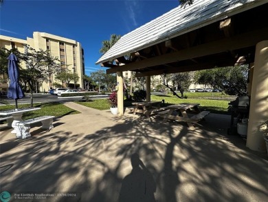 Welcome to this stunning 7th-floor condo in Environ Tower II on Inverrary Country Club in Florida - for sale on GolfHomes.com, golf home, golf lot