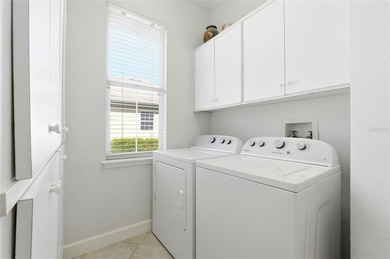 Gated custom home in the Gates of Lake Region! This quiet and on Lake Region Yacht Country Club in Florida - for sale on GolfHomes.com, golf home, golf lot