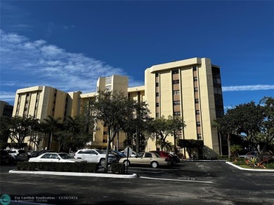 Welcome to this stunning 7th-floor condo in Environ Tower II on Inverrary Country Club in Florida - for sale on GolfHomes.com, golf home, golf lot