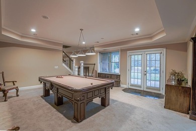 Experience refined living at 1041 Windermere Crossing an elegant on Windermere Golf Club in Georgia - for sale on GolfHomes.com, golf home, golf lot