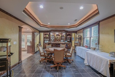 Experience refined living at 1041 Windermere Crossing an elegant on Windermere Golf Club in Georgia - for sale on GolfHomes.com, golf home, golf lot