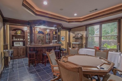 Experience refined living at 1041 Windermere Crossing an elegant on Windermere Golf Club in Georgia - for sale on GolfHomes.com, golf home, golf lot