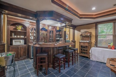 Experience refined living at 1041 Windermere Crossing an elegant on Windermere Golf Club in Georgia - for sale on GolfHomes.com, golf home, golf lot