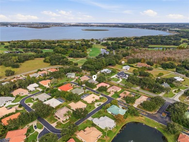 Gated custom home in the Gates of Lake Region! This quiet and on Lake Region Yacht Country Club in Florida - for sale on GolfHomes.com, golf home, golf lot