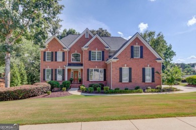 Welcome to this stunning 6 bedroom, 4 bath lakefront home in on Hamilton Mill Golf Club in Georgia - for sale on GolfHomes.com, golf home, golf lot