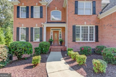 Welcome to this stunning 6 bedroom, 4 bath lakefront home in on Hamilton Mill Golf Club in Georgia - for sale on GolfHomes.com, golf home, golf lot