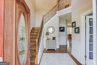 Welcome to this stunning 6 bedroom, 4 bath lakefront home in on Hamilton Mill Golf Club in Georgia - for sale on GolfHomes.com, golf home, golf lot