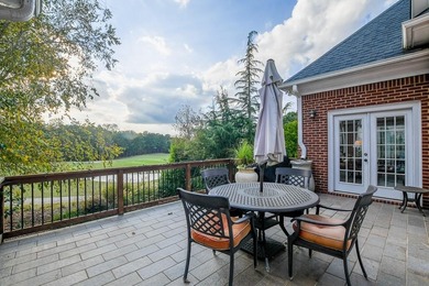 Experience refined living at 1041 Windermere Crossing an elegant on Windermere Golf Club in Georgia - for sale on GolfHomes.com, golf home, golf lot